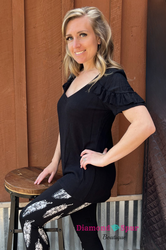 Black v neck tee shirt with cut out back and ruffle sleeves