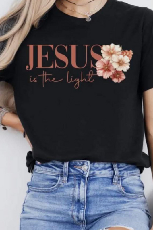 Black t-shirt that says "Jesus is the light" and beautiful pink and white flowers