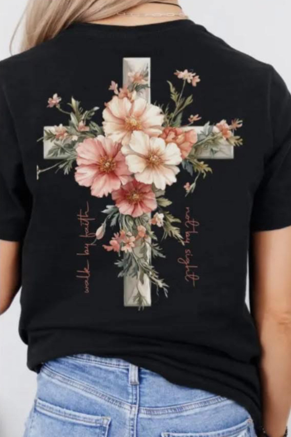Back of the t-shirt. Large cross covered in beautiful floral arrangement 